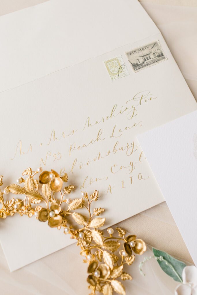 gold and cream wedding envelope