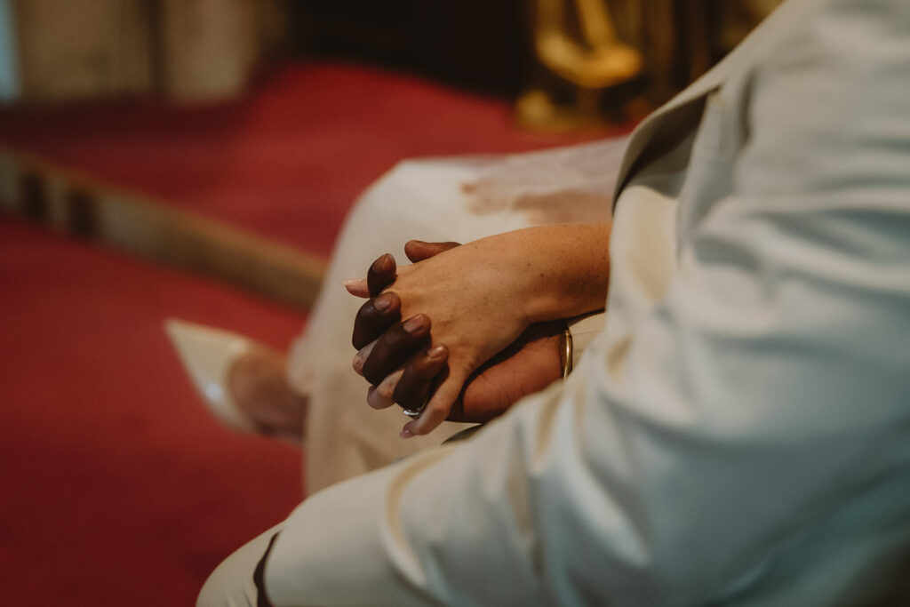 Bride and Groom holding hands during ceremony.
Hannah Rose Weddings & Events