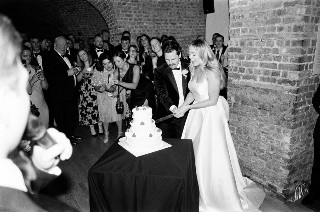 Bride and Groom, Cake Cutting, Wedding. Hannah Rose Weddings