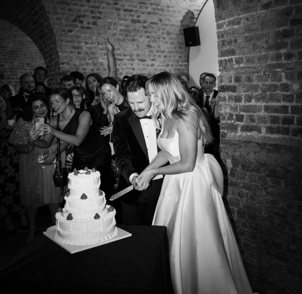 cake cutting 
Bride and groom
Wedding 